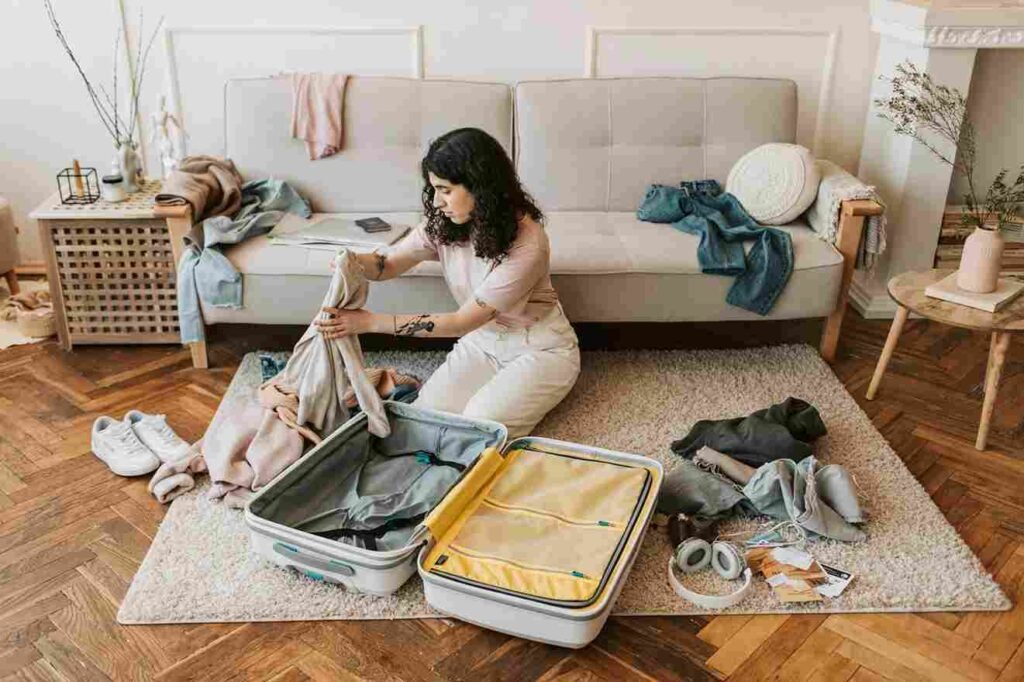 woman packing suitcase aesthetic