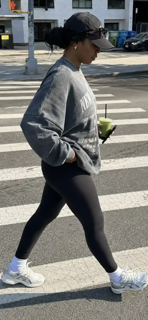 14. Leggings with an oversized graphic sweatshirt