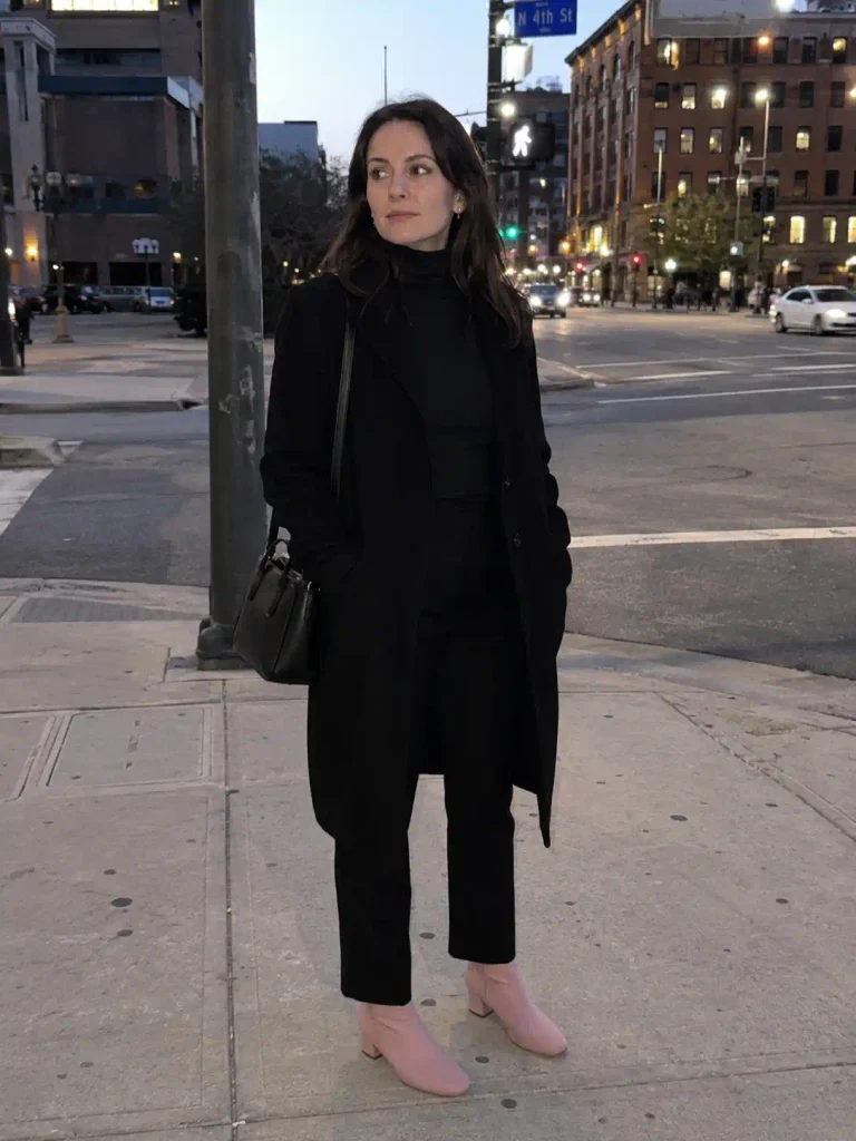 All-black outfit with pink boots