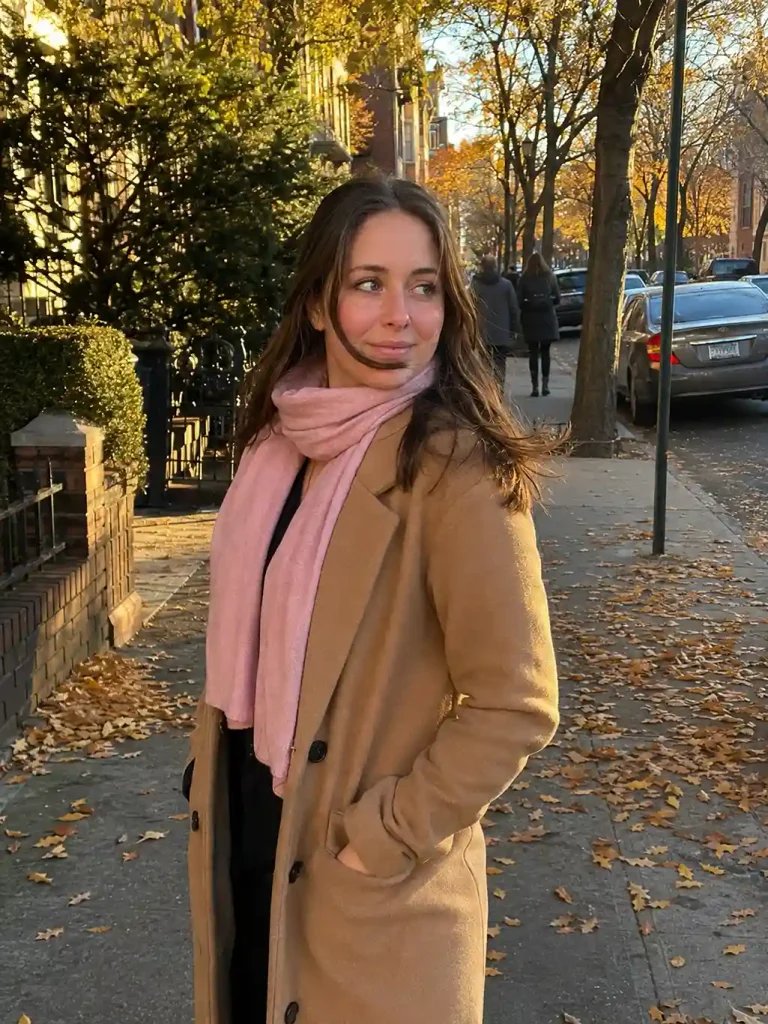 Camel coat over an all-