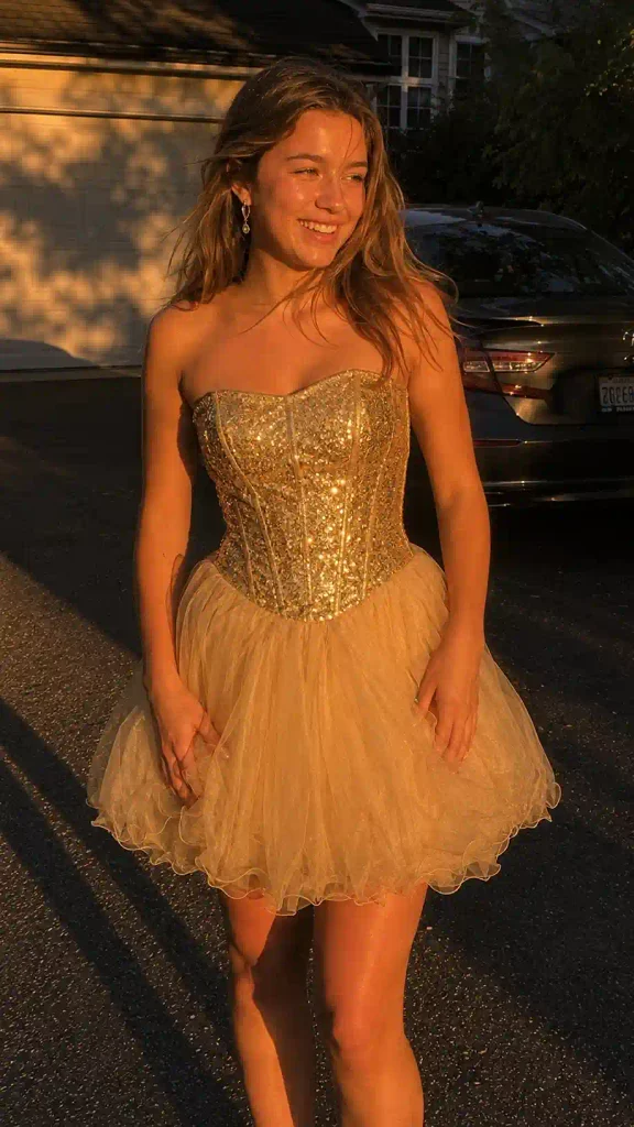 Gold sequin corset with a tulle mini skirt