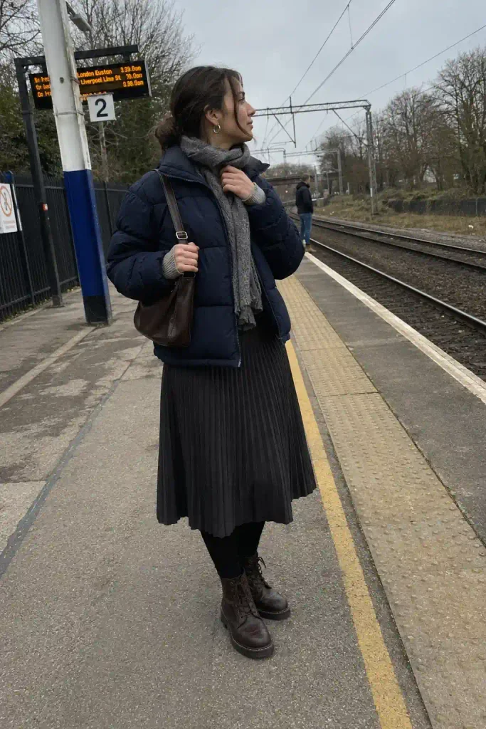 Puffer with a midi skirt and tights