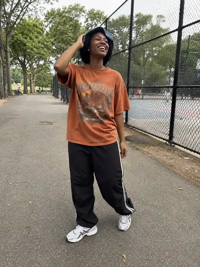Track pants and an oversized tee