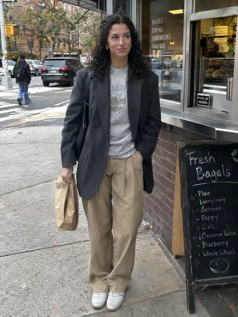 Blazer over a graphic sweatshirt