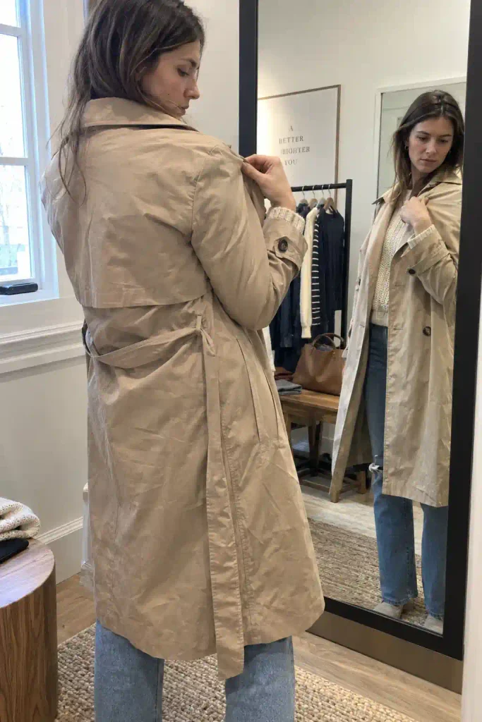 Trench coat over a turtleneck and tailored