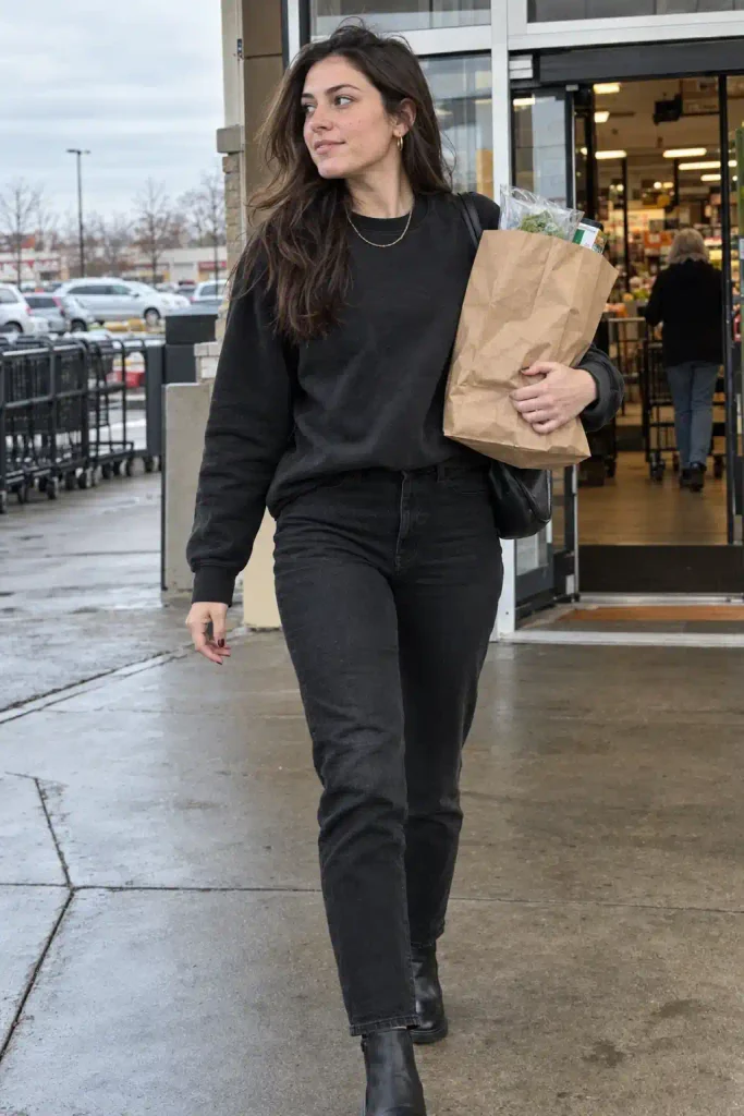 Black sweatshirt with black jeans